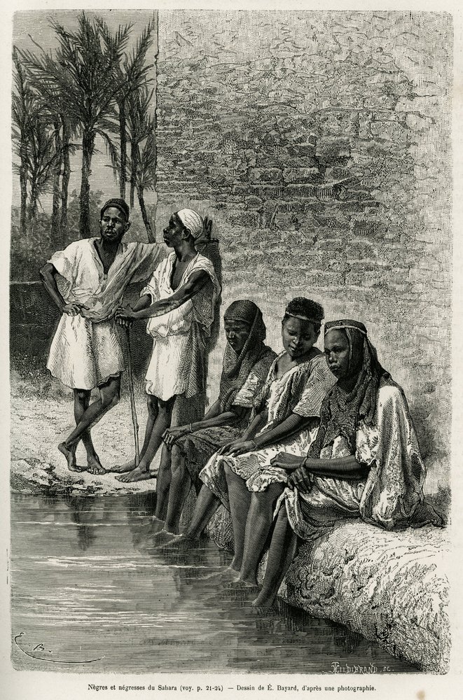 Zwarte mannen en vrouwen uit de Sahara, aan de oevers van de Oued Rir. Gravure door E. Bayard ter illustratie van De Algerijnse Sahara door V. Largeau, 1874-1878, gepubliceerd in Le Tour du monde onder leiding van Édouard Charton (1807-1890) door Emile Antoine Bayard