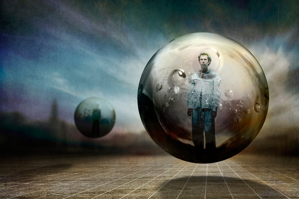 Man in een zwevende bol door Ben Goossens ✝