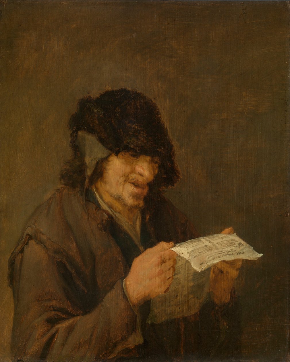 Man die een krant leest door Adriaen van Ostade
