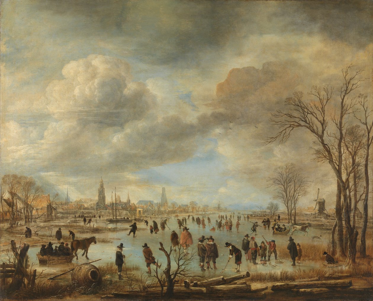 Winterlandschap bij een stad door Aert van der Neer