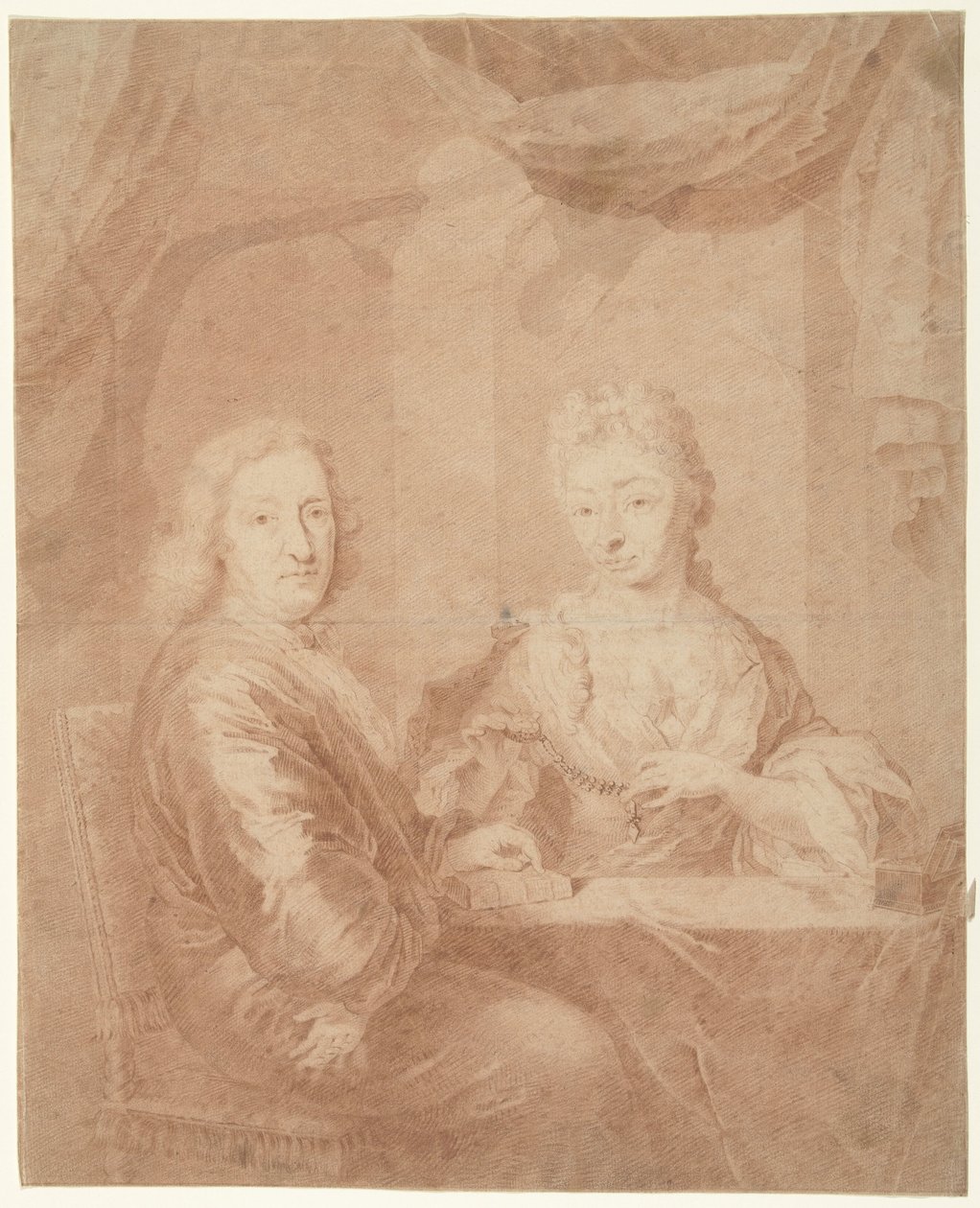Portret van een man en vrouw aan een tafel door Anonymous