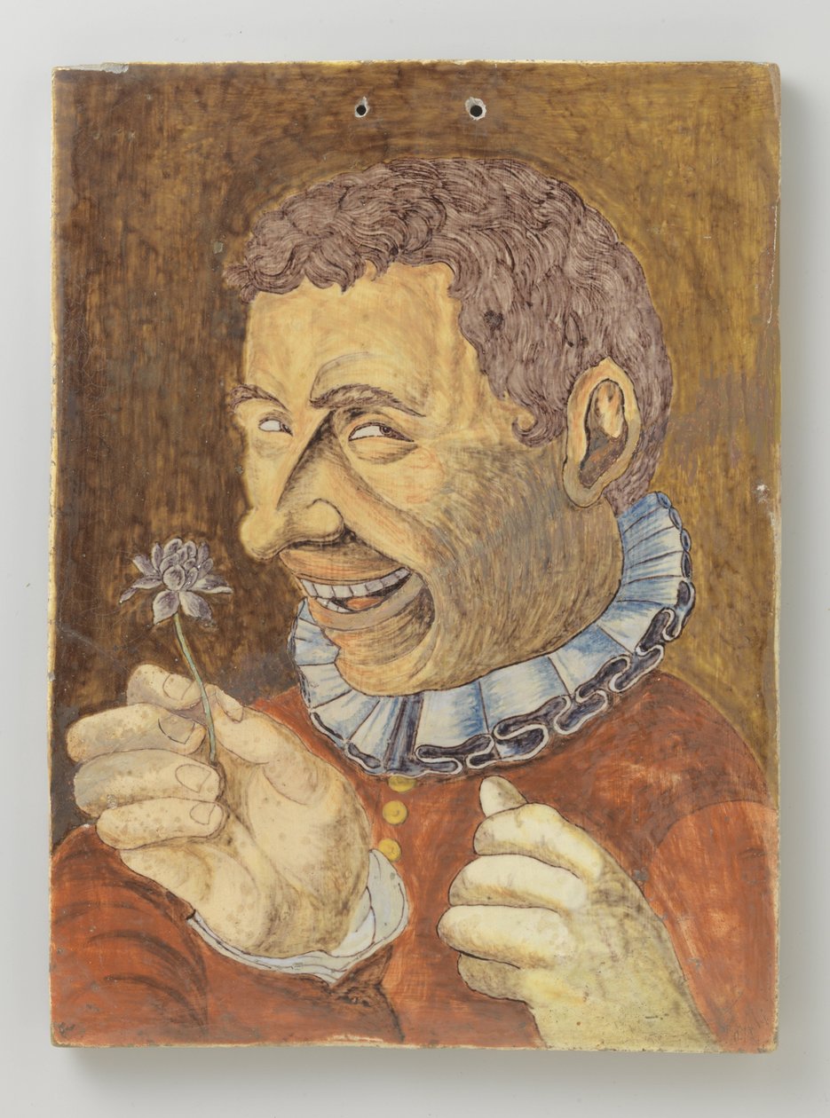 Plaat van faience met man met bloem door Anonymous