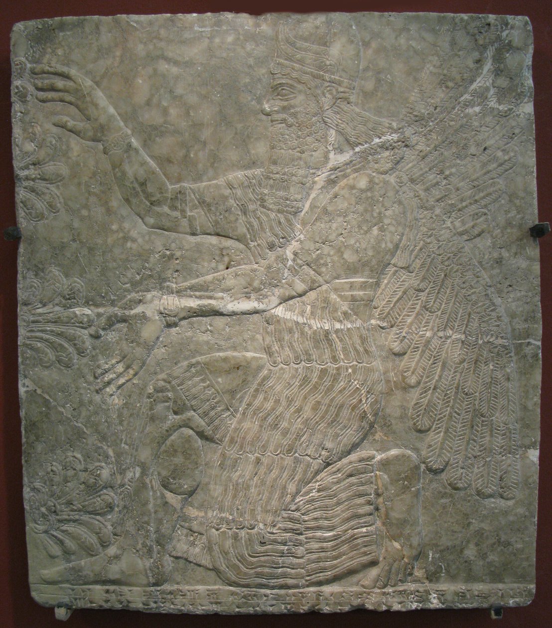 Gevleugelde godheid bij de heilige boom. Reliëf uit het paleis van Ashurnasirpal II in Kalhu, Nimrud door Assyrian