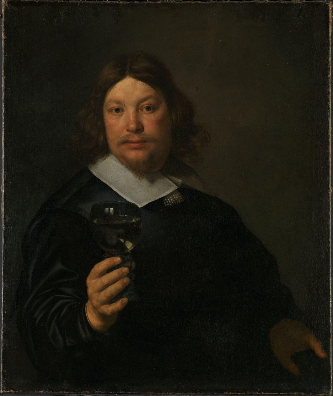 Man met een glas wijn door Bartolomeus van der Helst
