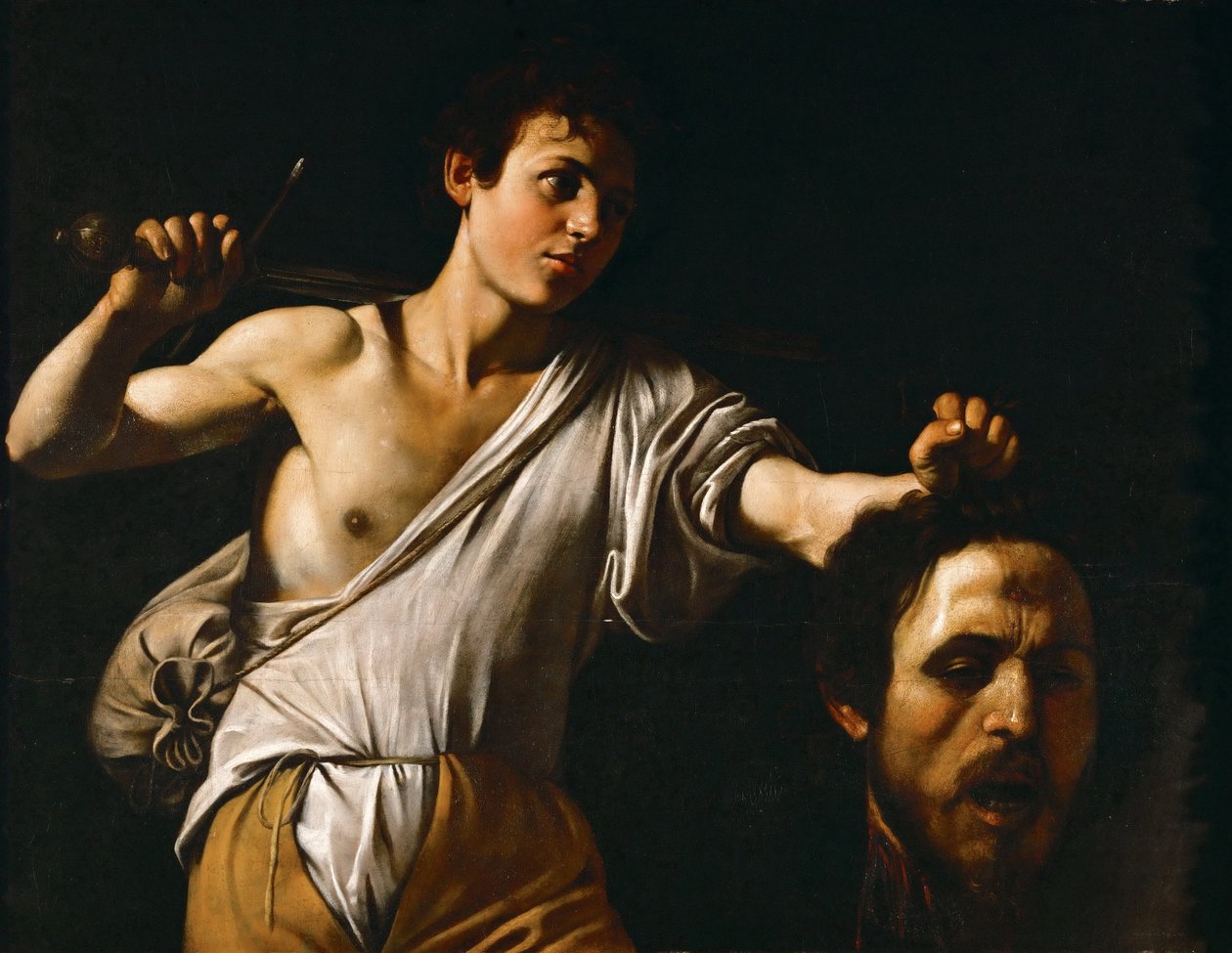 Italiaans:  Davide con la testa di Golia David met het hoofd van Goliath door Caravaggio