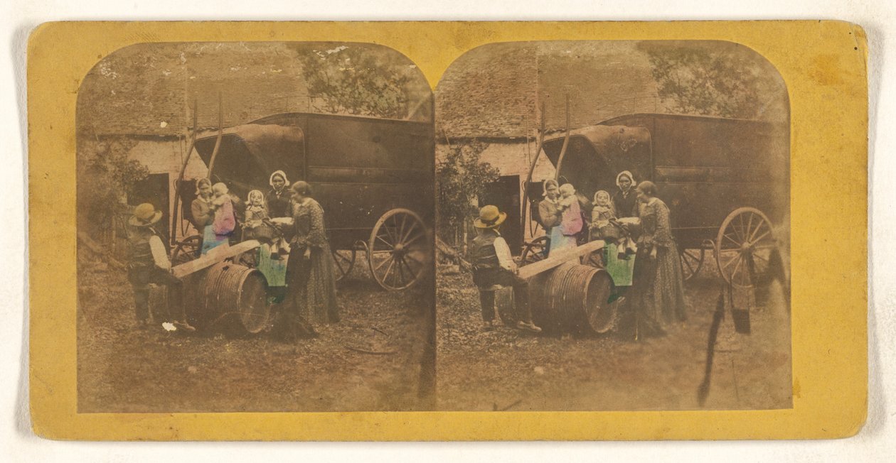 [Familiegroep voor een wagen, vader en kind op geïmproviseerde wip]. door Charles Peeters
