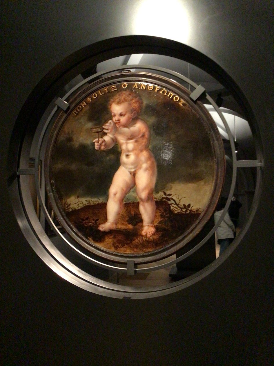 Portret van Adam Wachendorff, met een putto die bellen blaast door Cornelis Ketel