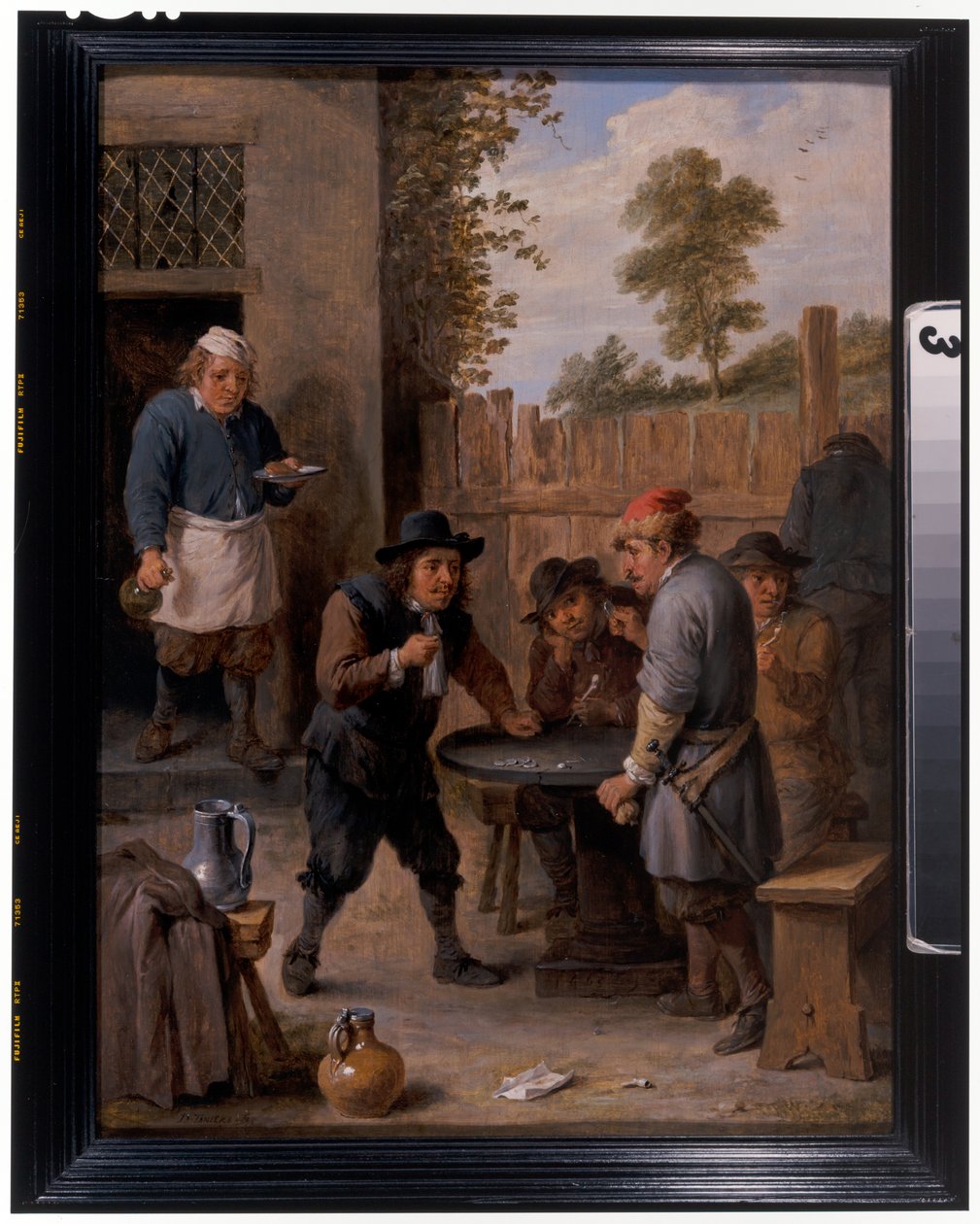 Boeren die dobbelstenen spelen buiten een herberg door David the Younger Teniers