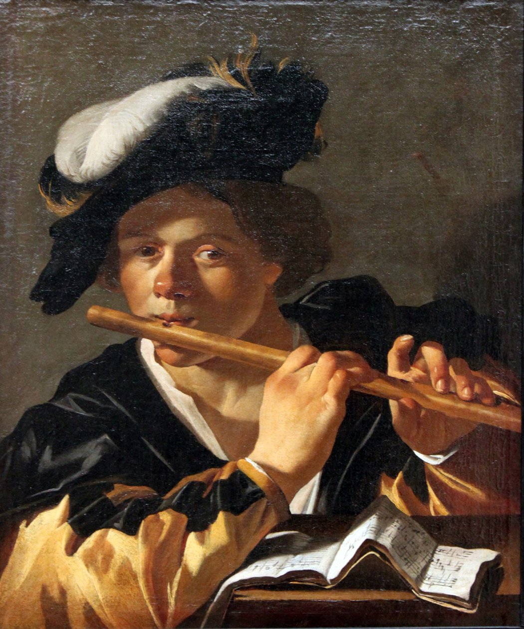 De fluitspeler door Dirck van Baburen