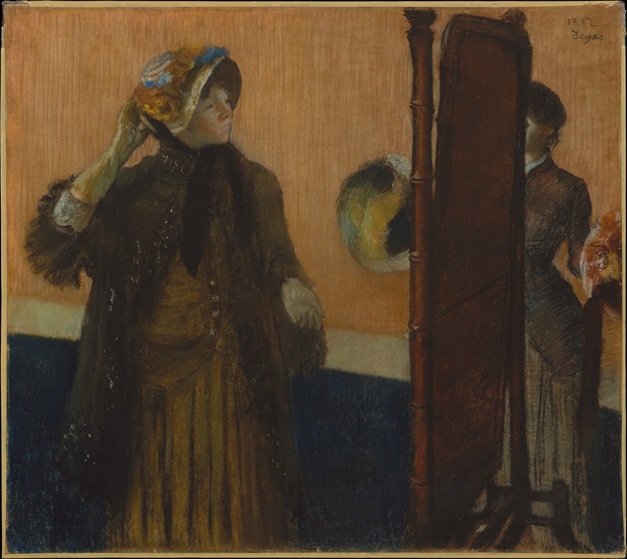 Bij de modiste door Edgar Degas