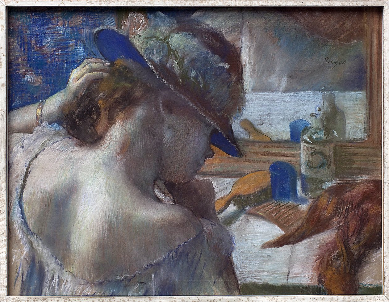 Voor de spiegel door Edgar Degas