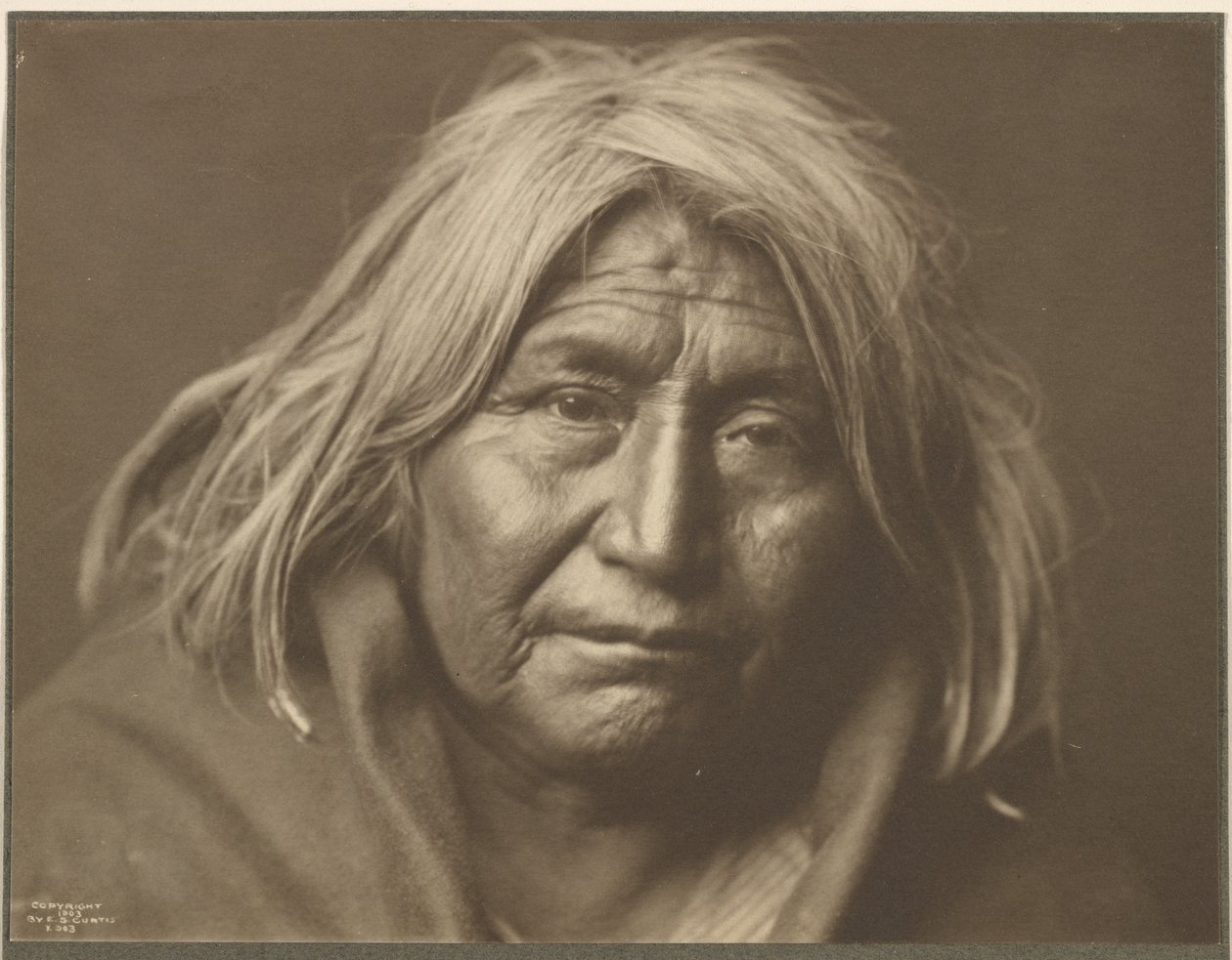 [Een Apache] door Edward S. Curtis
