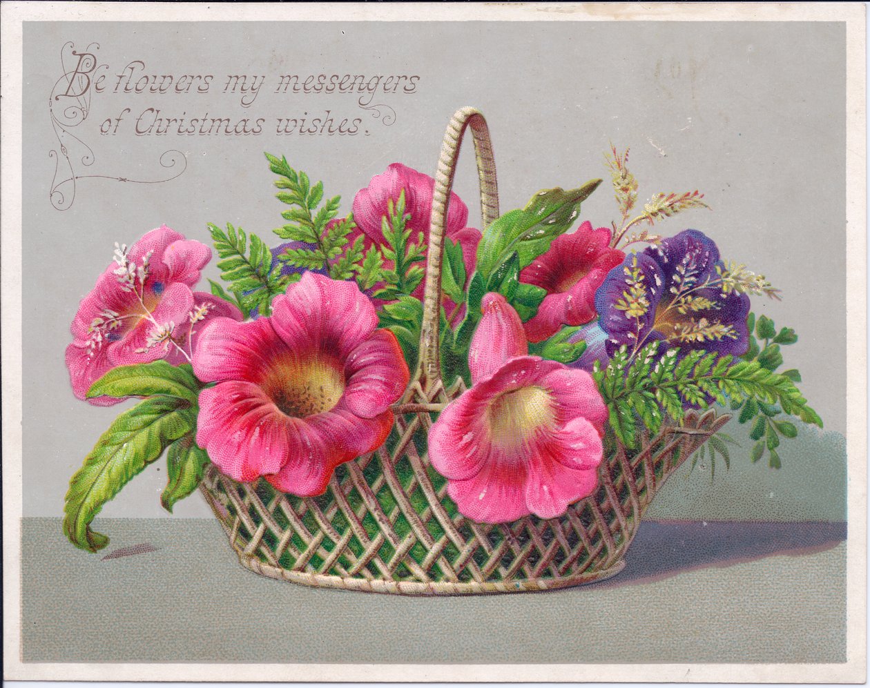 Een Victoriaanse kerstkaart van bloemen in een rieten mand, ca. 1880 door English School