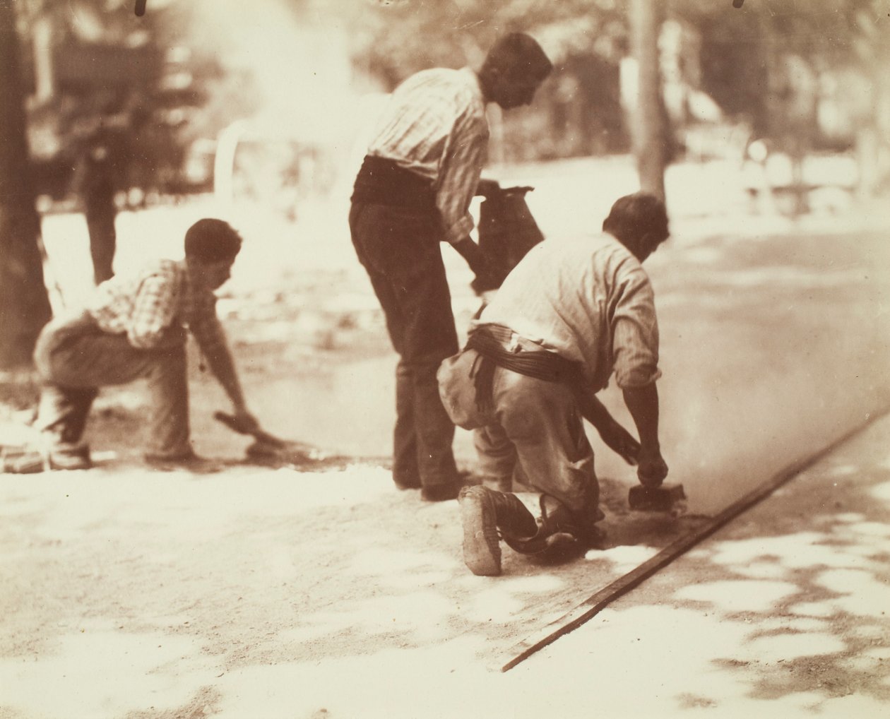 Asfaltar­beiders door Eugène Atget