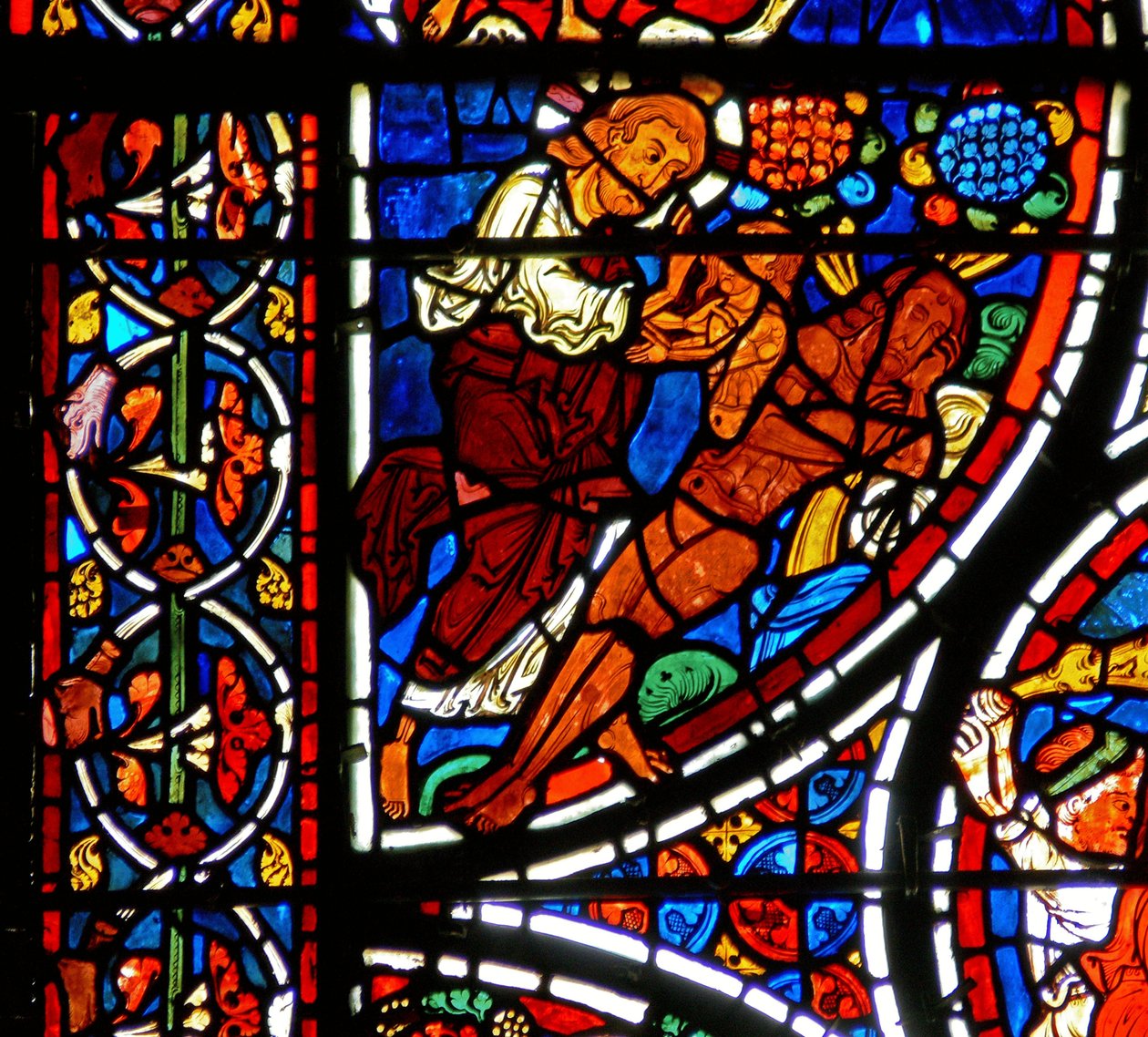 Detail (schepping van Eva) uit een raam van de gelijkenis van de Barmhartige Samaritaan door French School