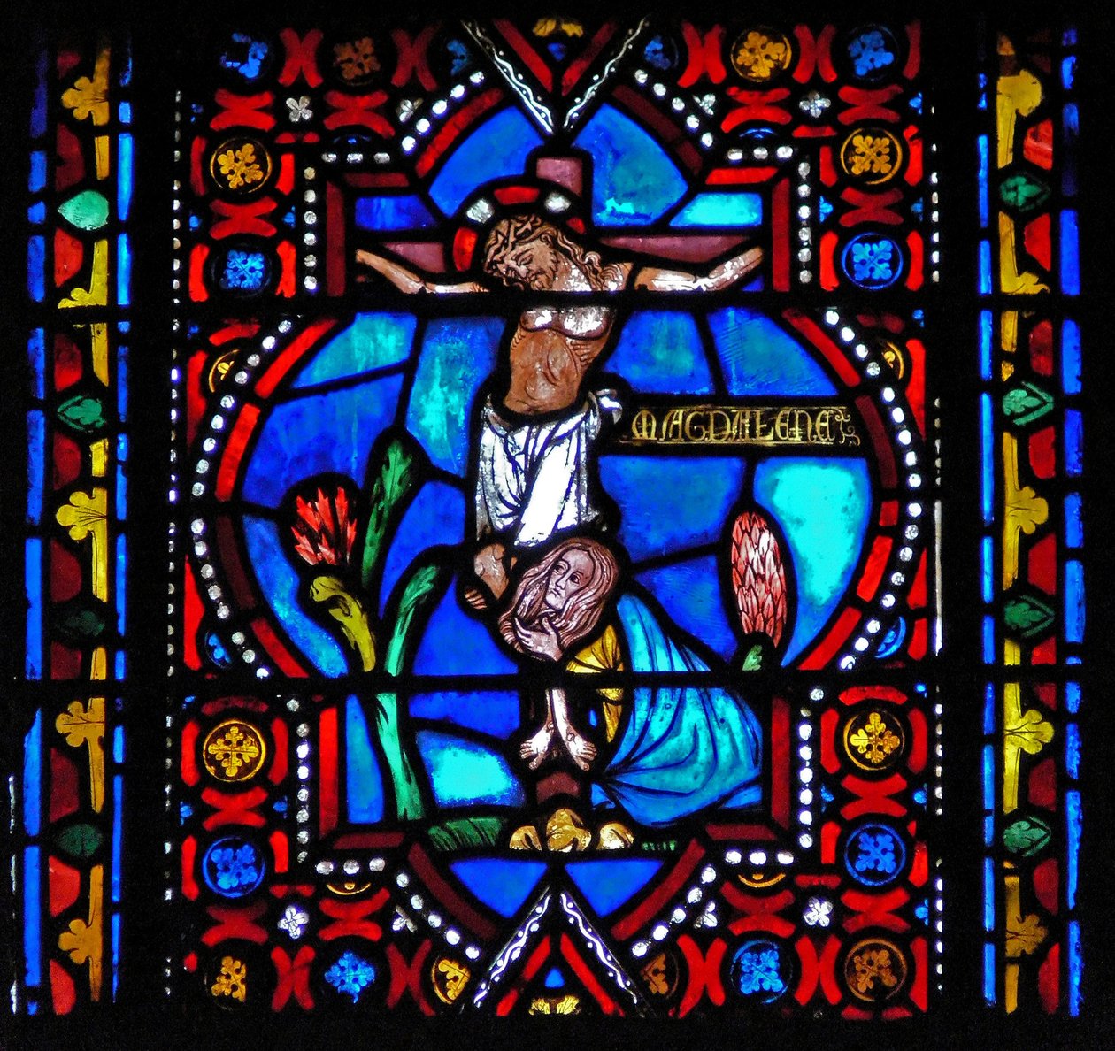 Raam n1-L met een scène uit het leven van St. Maria Magdalena - de heilige aan de voet van het kruis door French School