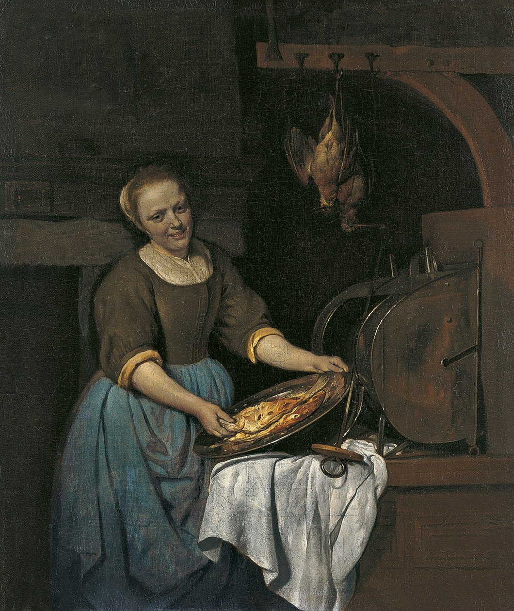 Keukenmeid bereidt vis door Gabriel Metsu