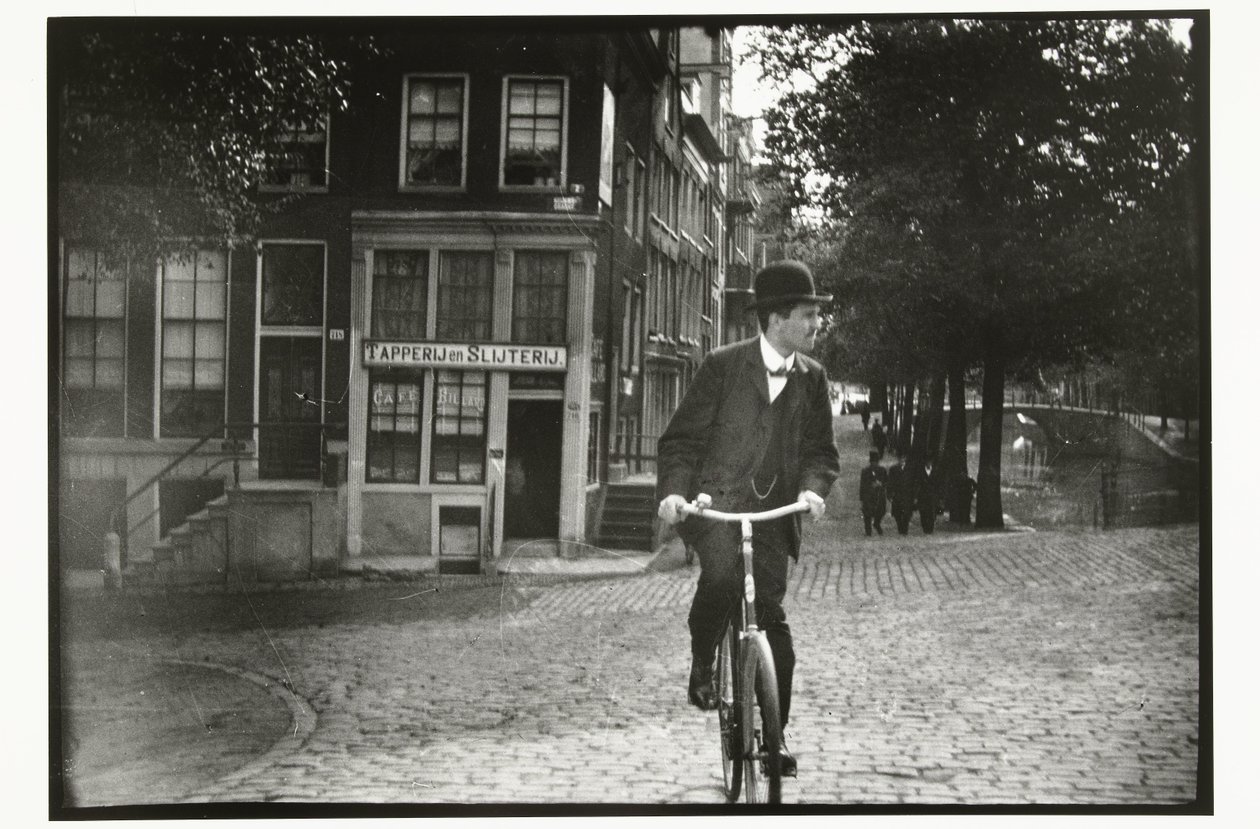Fietser op de Keizersgracht in Amsterdam door George Hendrik Breitner