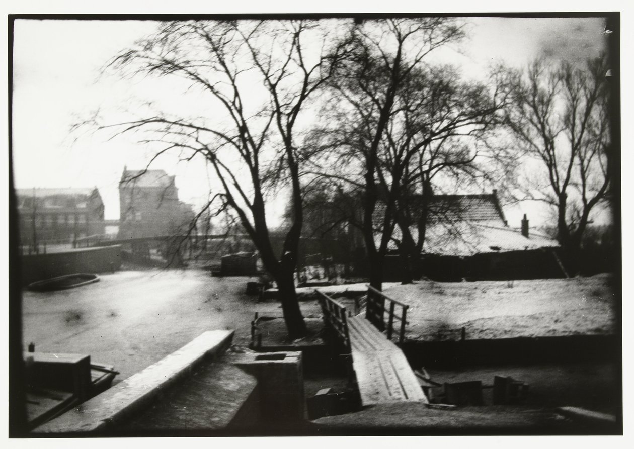 Wintergezicht over de Amstel in Amsterdam door George Hendrik Breitner