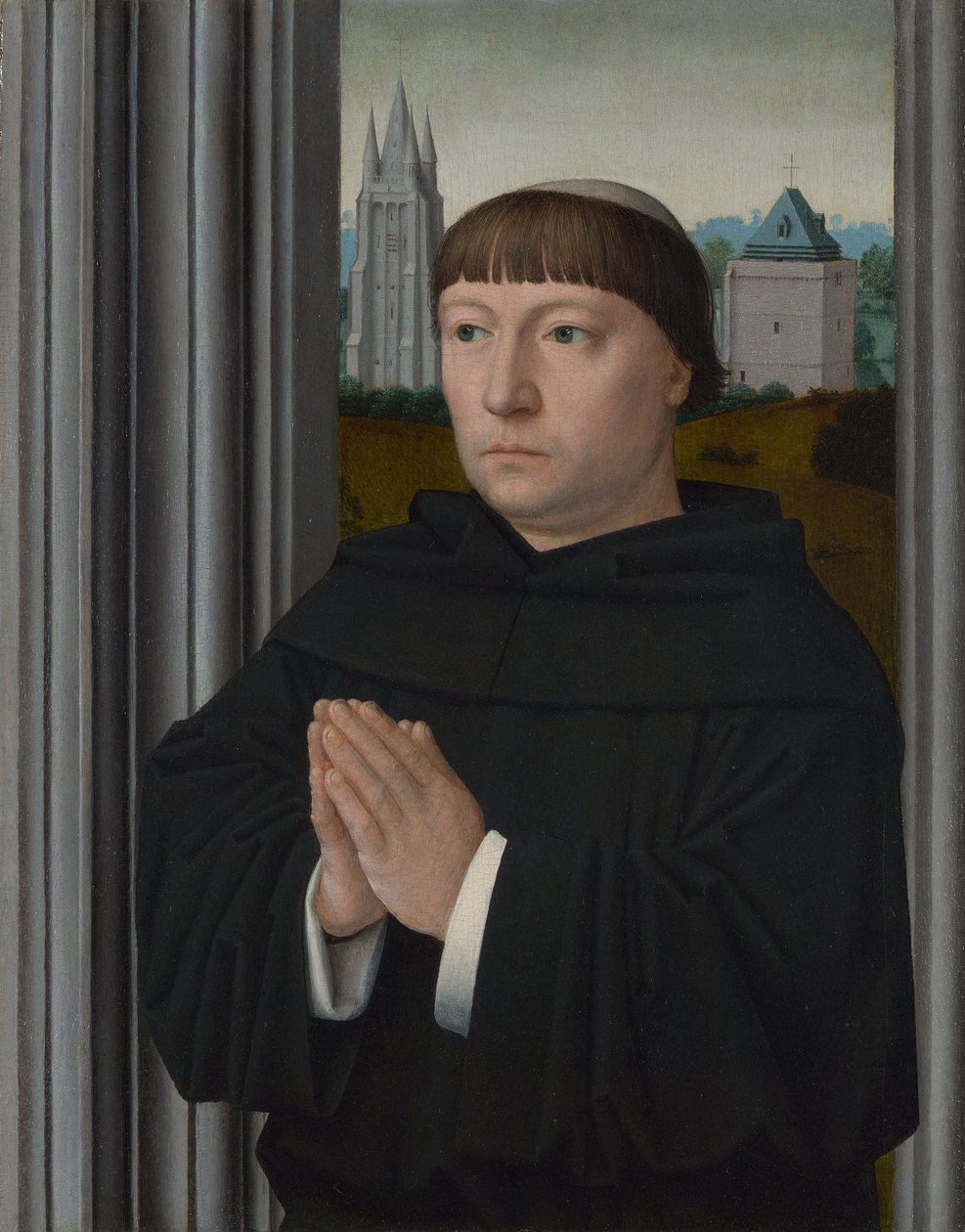 Een Augustijner monnik die bidt door Gerard David