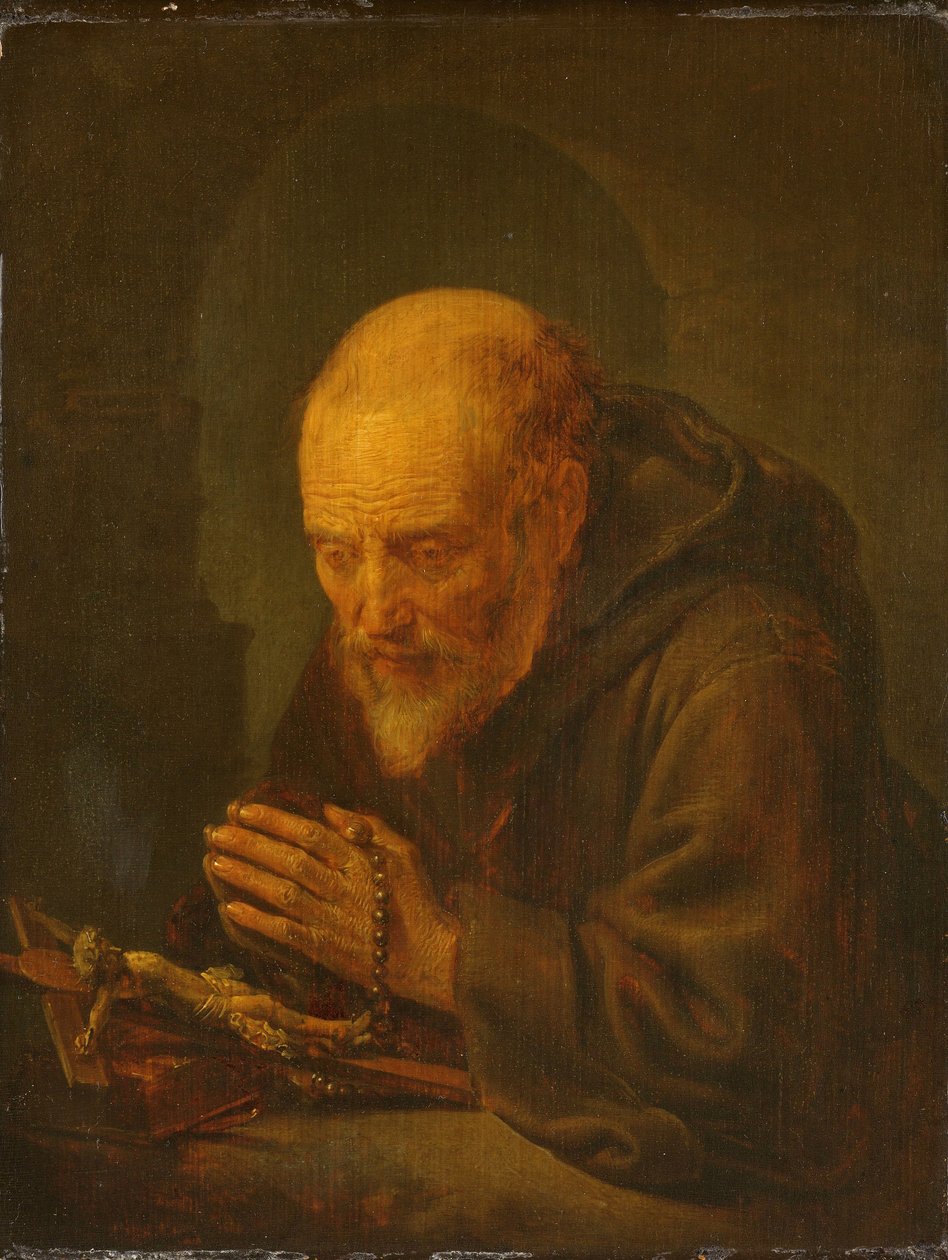Een kluizenaar in gebed door Gerrit Dou