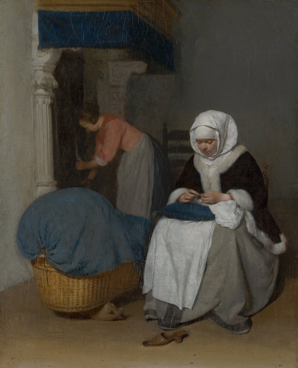Vrouw die naast een wieg zit te naaien door Gerard ter Borch