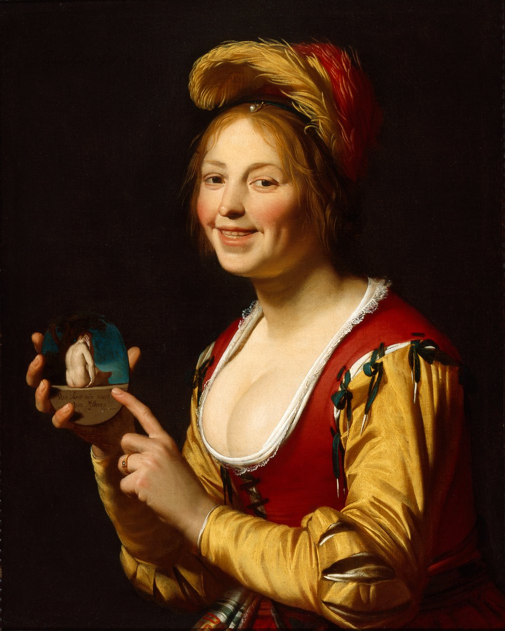 Lachend meisje, een courtisane, met een obsceen beeld in haar hand door Gerrit van Honthorst