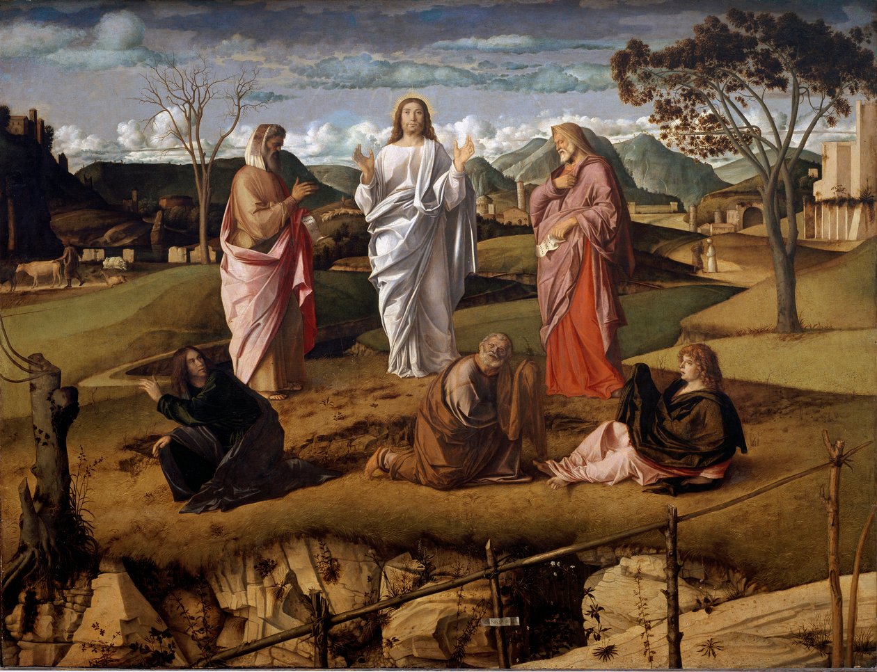 De transfiguratie van Christus. De personages van het Oude Testament Mozes en Elia zijn rond Jezus afgebeeld. De handtekening van de kunstenaar is weergegeven op een papier in de voorgrond. Schilderij door Giovanni Bellini genaamd il Giambellino (1432) door Giovanni Bellini