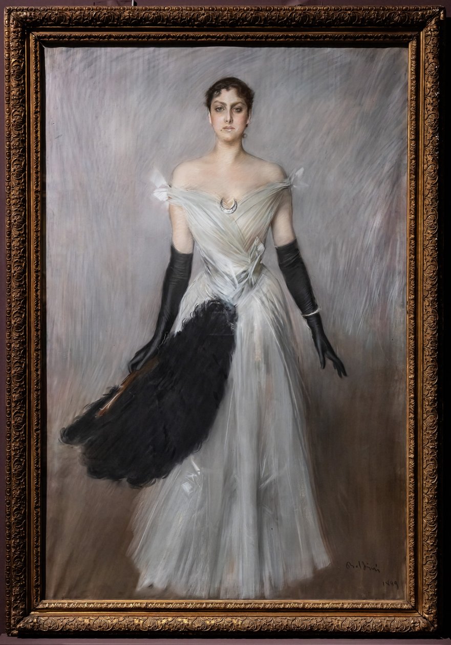 Portret van een dame in het wit met handschoenen en waaier door Giovanni Boldini