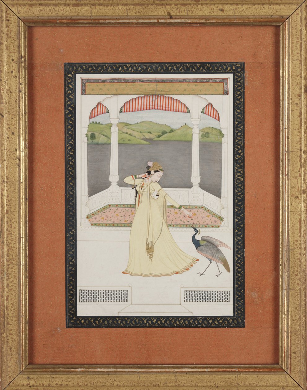 Dame die een pauw lokt met een parelketting, c.1800 door Indian School