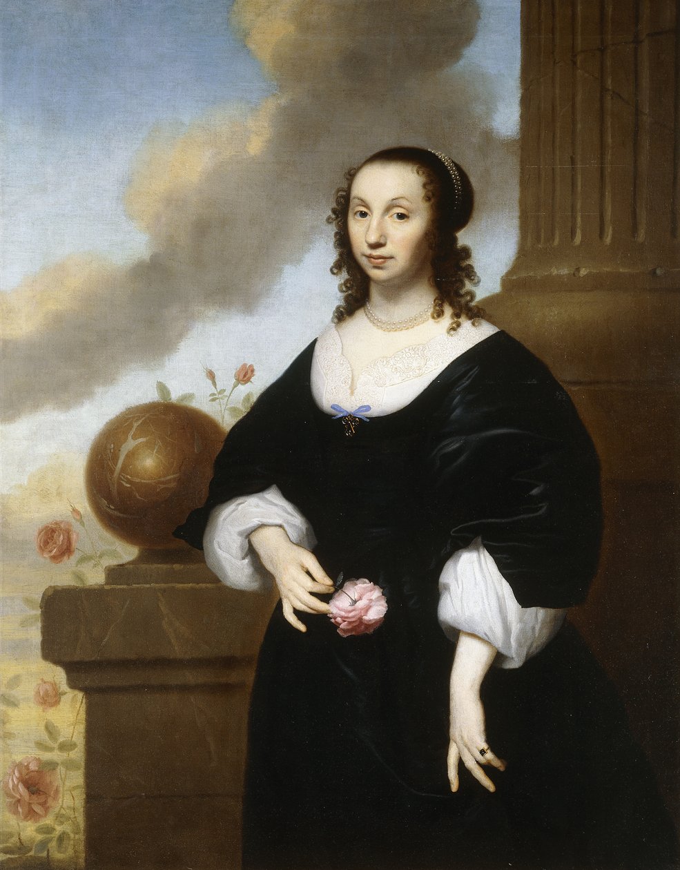 Portret van een dame, staand driekwart lengte, gekleed in een zwarte satijnen jurk met witte kanten afwerking door Isaac Luttichuys