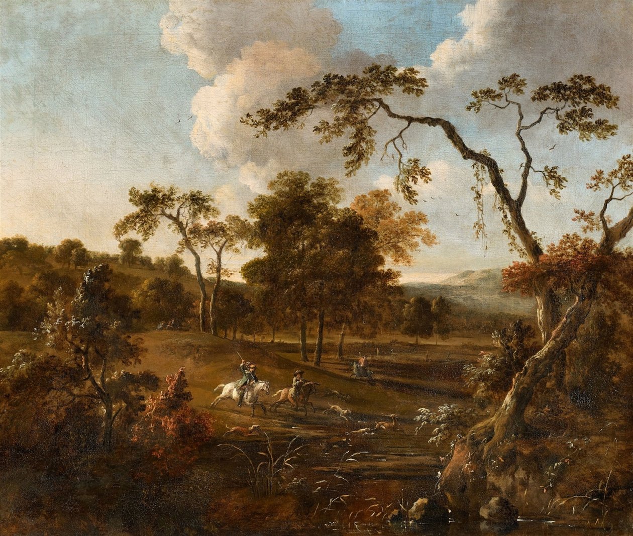 Landschap met glooiende heuvels en een hertenjacht door Jan Wijnants