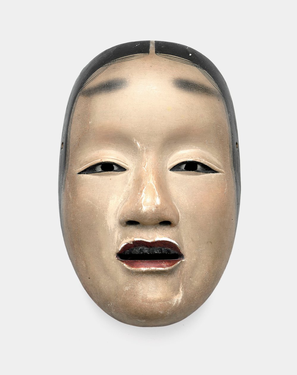 Een houten masker met gofun-grond, geschilderd met sumi voor het haar, de ogen en de tanden en rood voor de lippen door Japanese School