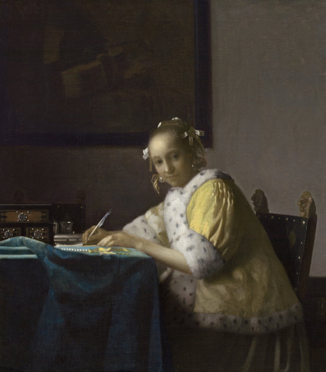 Een dame schrijft door Johannes Vermeer