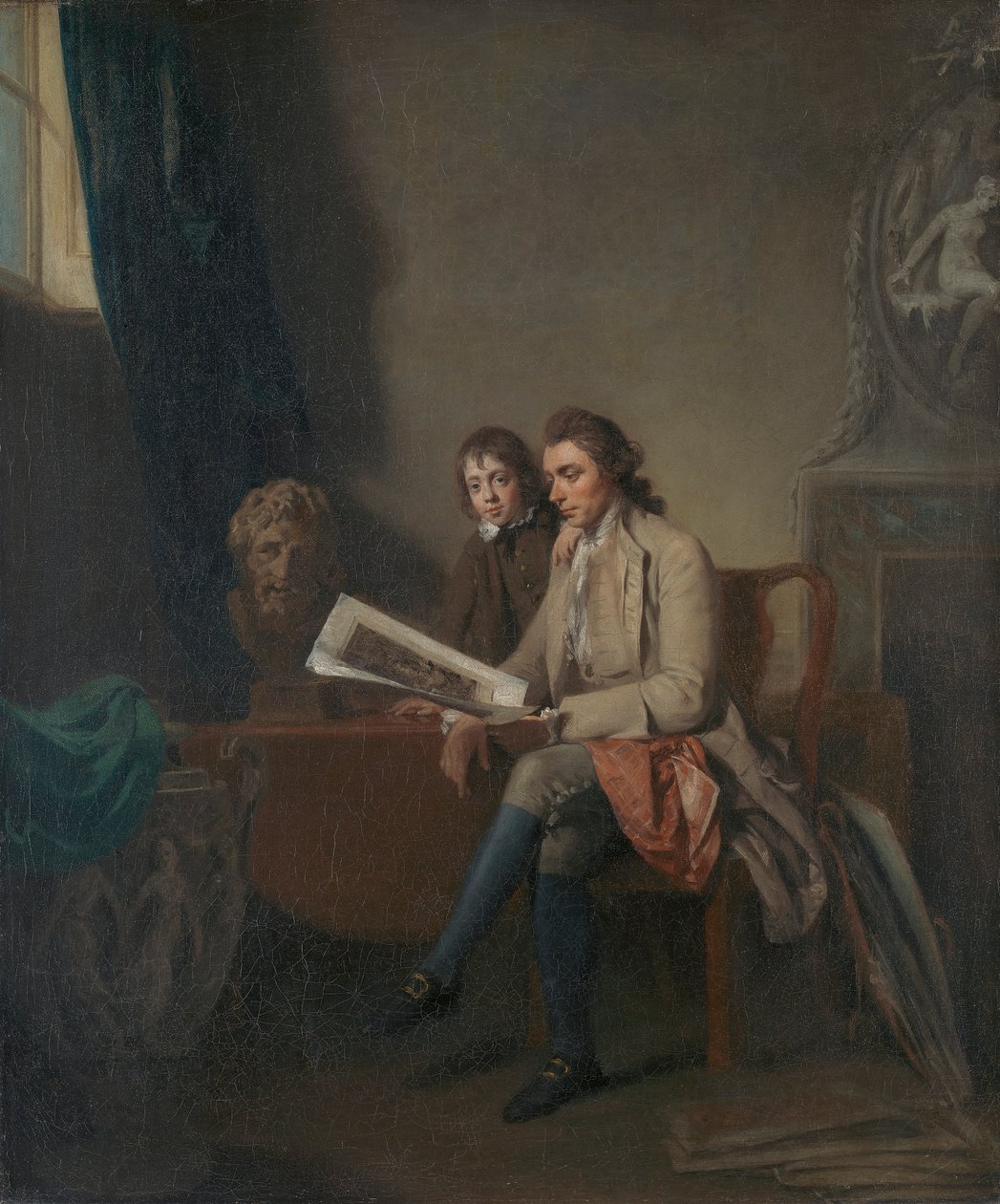 Portret van een man en een jongen die naar prenten kijken door John Hamilton Mortimer