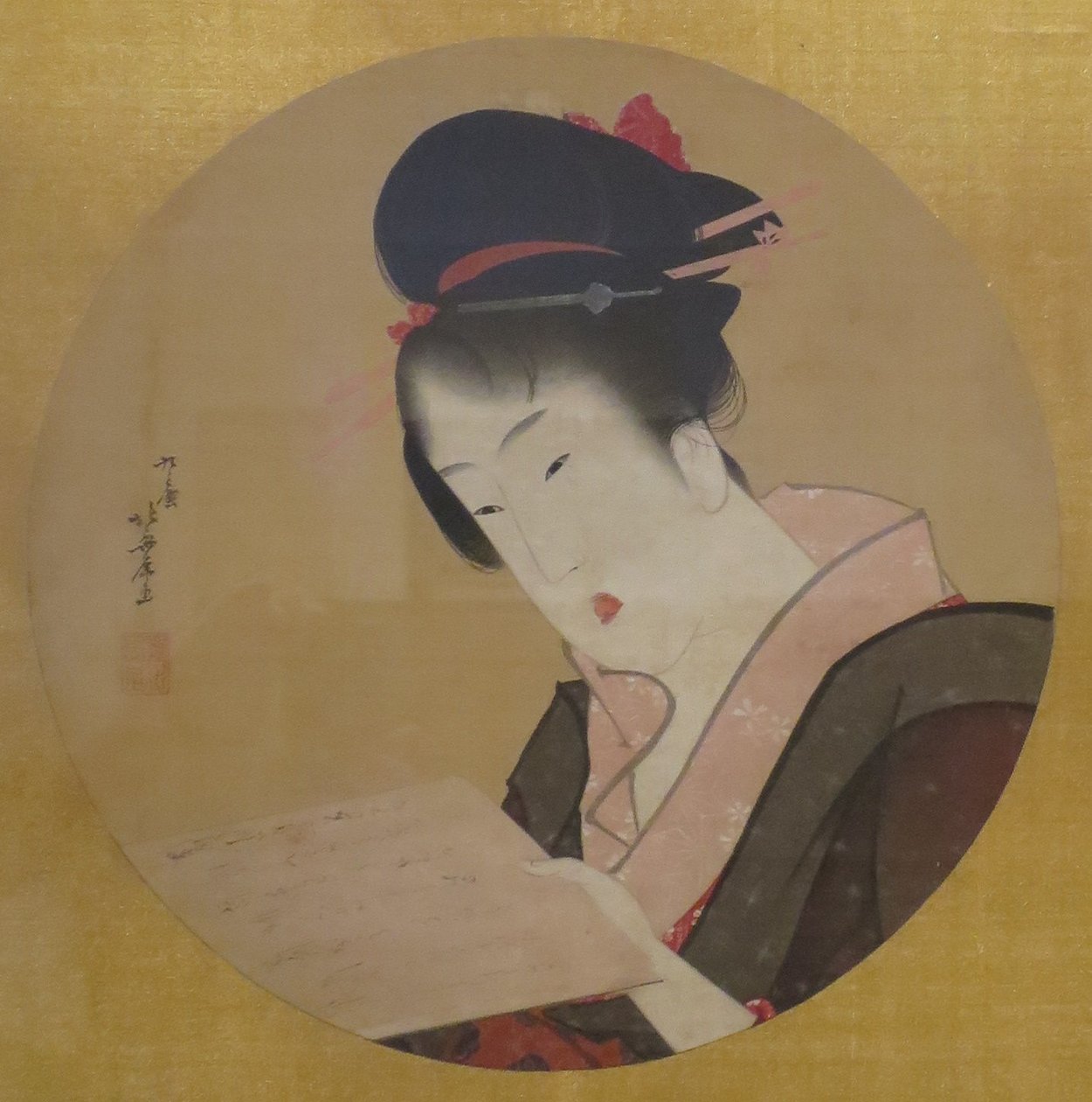 Vrouw die een brief leest door Katsushika Hokusai