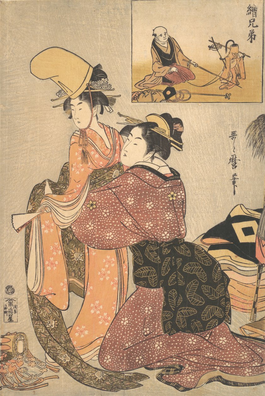 Een vrouw kleedt een meisje aan voor de Kabuki-dans 