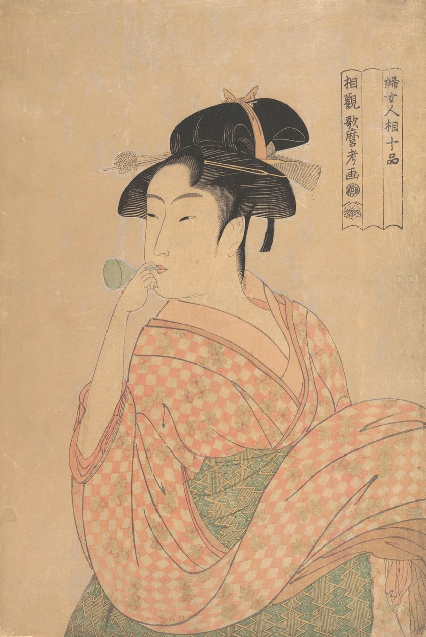 Jonge vrouw die een popenglas lawaaimaker blaast door Kitagawa Utamaro