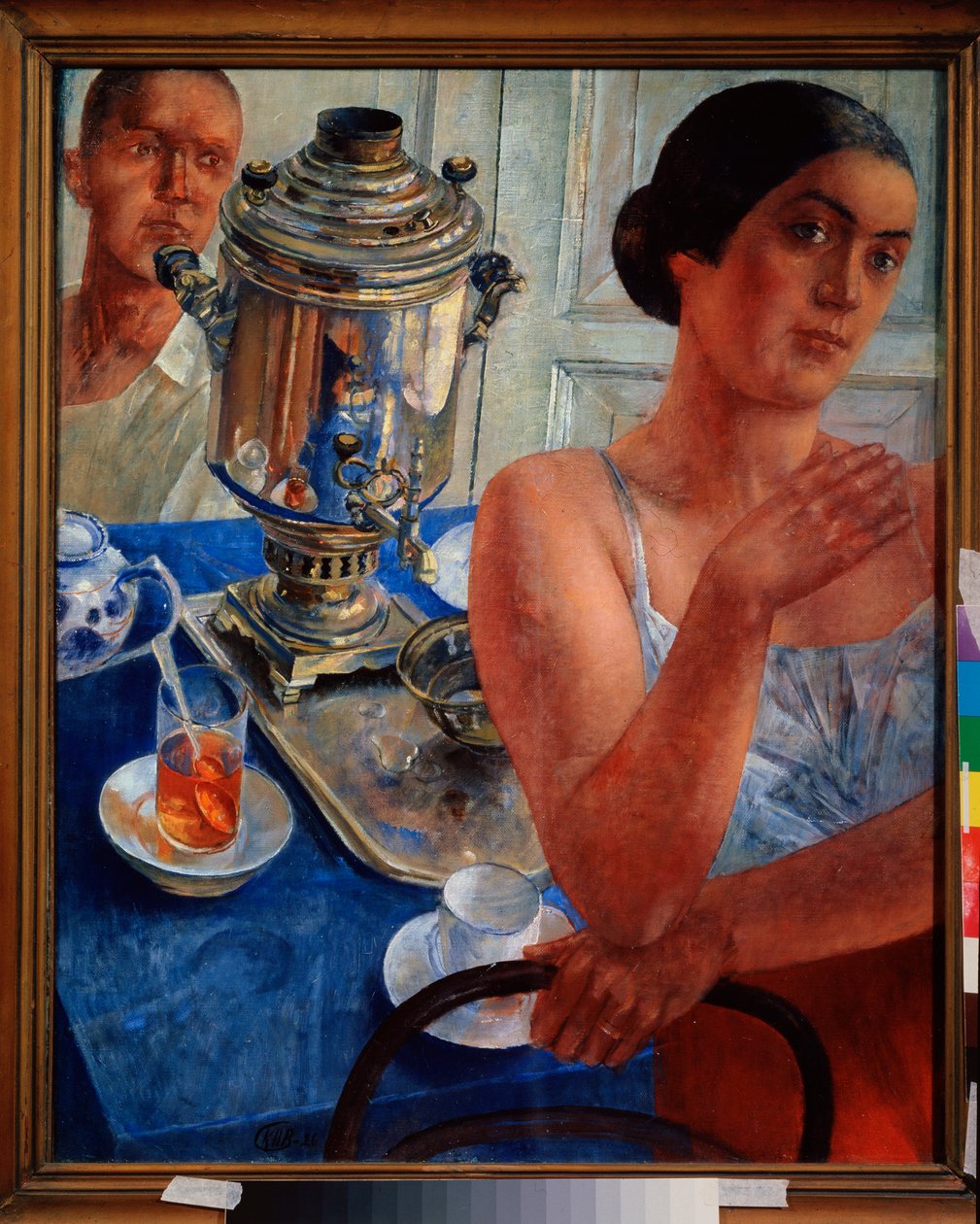 Rondom de samovar. (Scène uit het dagelijks leven, een stel drinkt thee). door Kuzma Sergeevich Petrov Vodkin