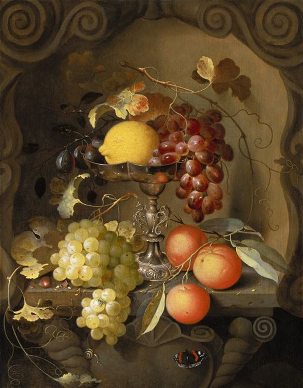 Stilleven van fruit op en rond een tazza, in een nis door Laurens Craen