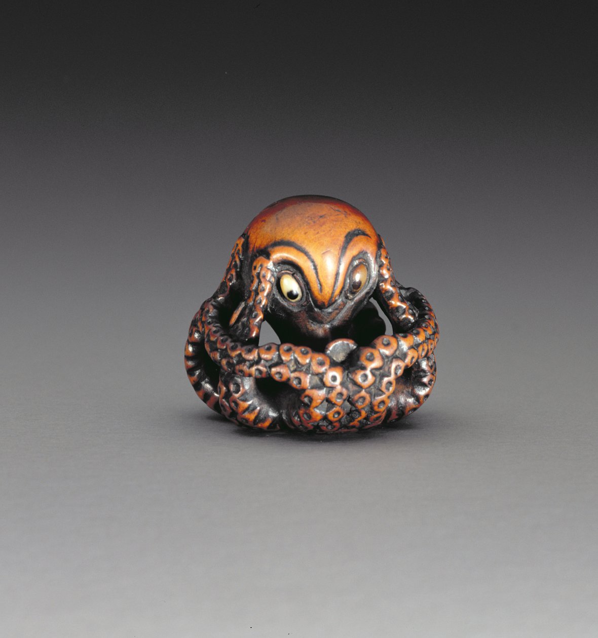 Netsuke die een octopus toont door Masanao