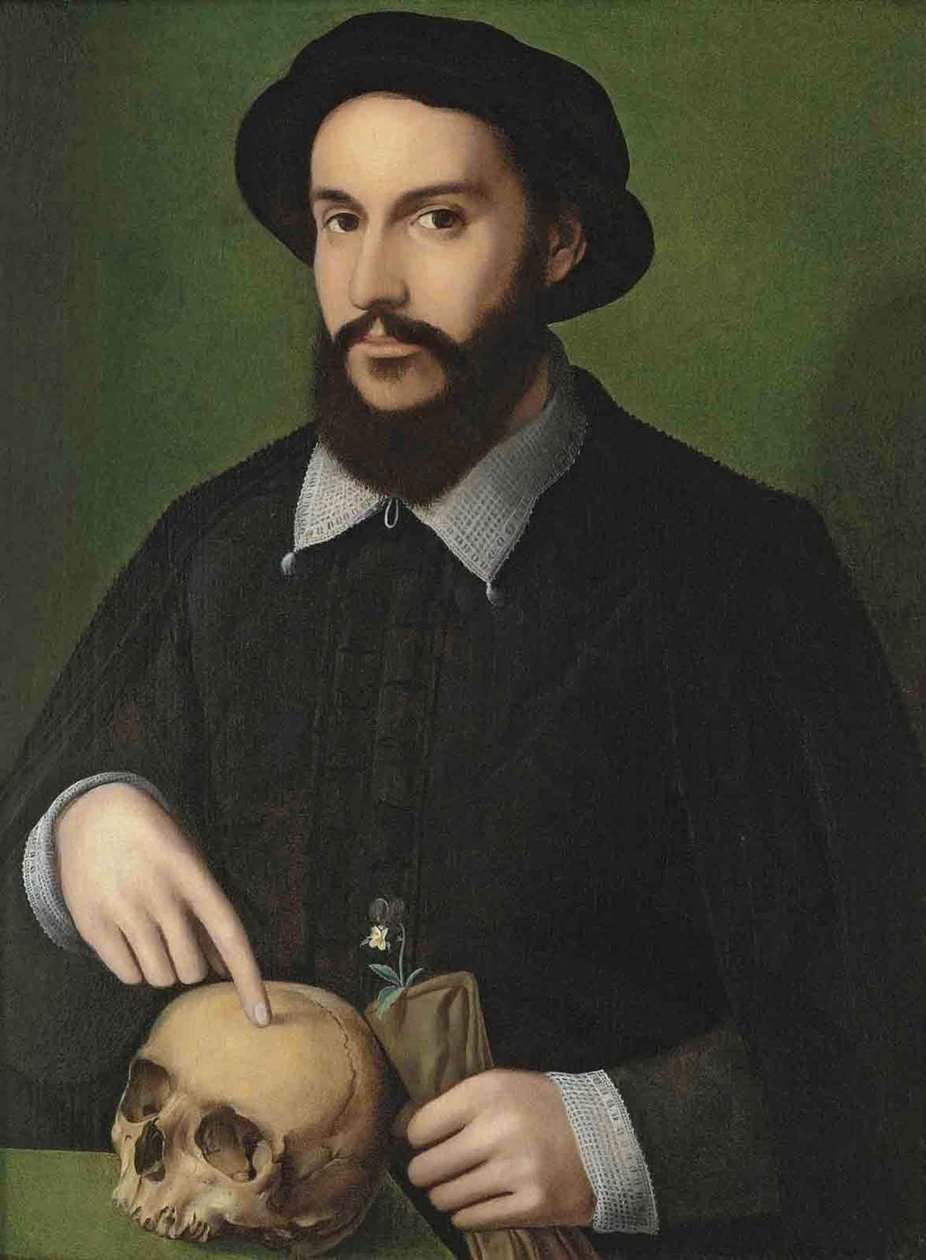 Portret van een man die naar een schedel wijst door Master of the 1540s