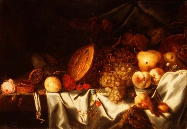 Een meloen, druiven en ander fruit met een roos, een nautilusbeker en een verge horloge op een gedrapeerde richel door Michiel (follower of) Simons