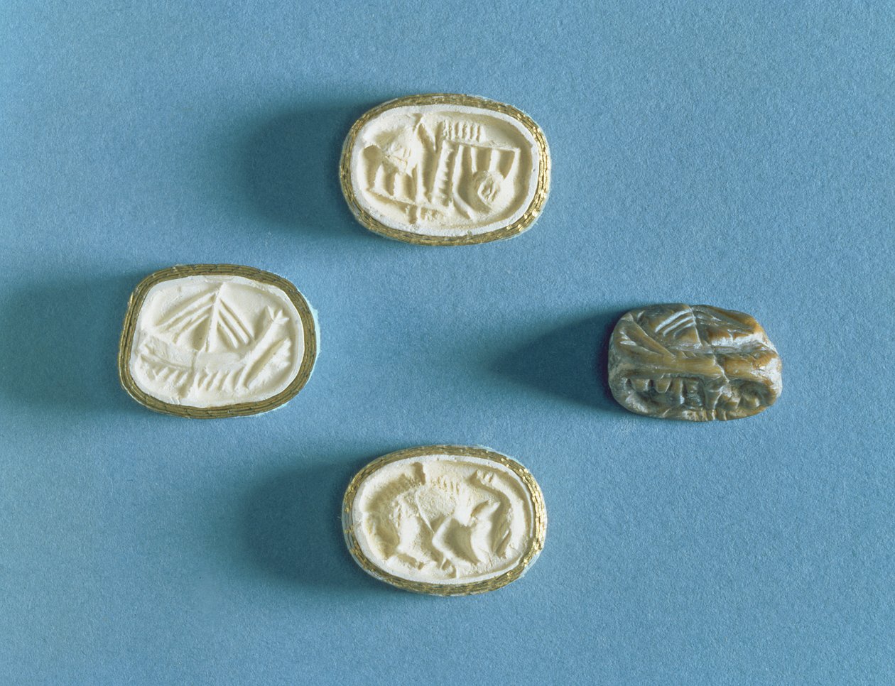 Zegel met drie indrukken uit Knossos, vroeg-Minoïsch door Minoan