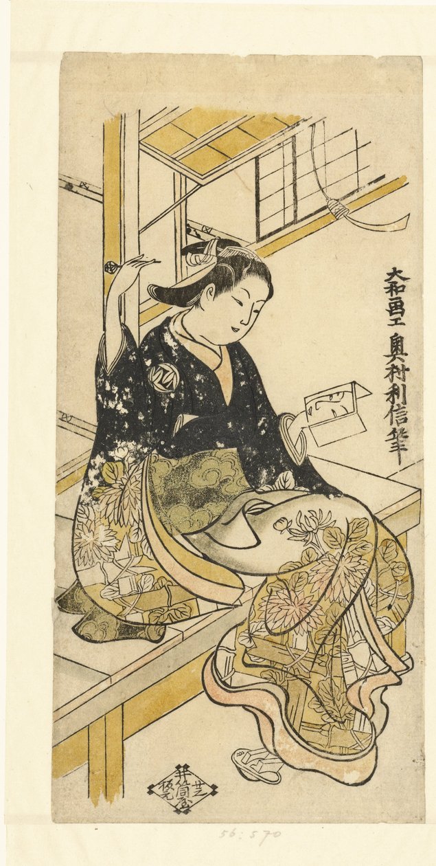 Vrouw met handspiegel door Okumura Toshinobu