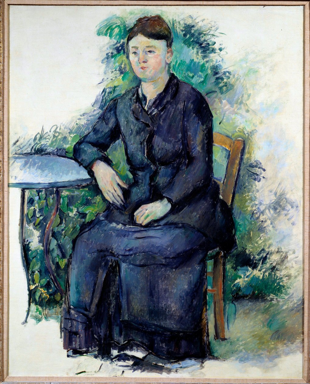 Portret van Madame Cezanne in een tuin door Paul Cézanne
