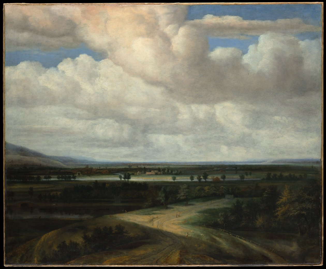 Een panoramisch landschap met een landgoed door Philips Koninck