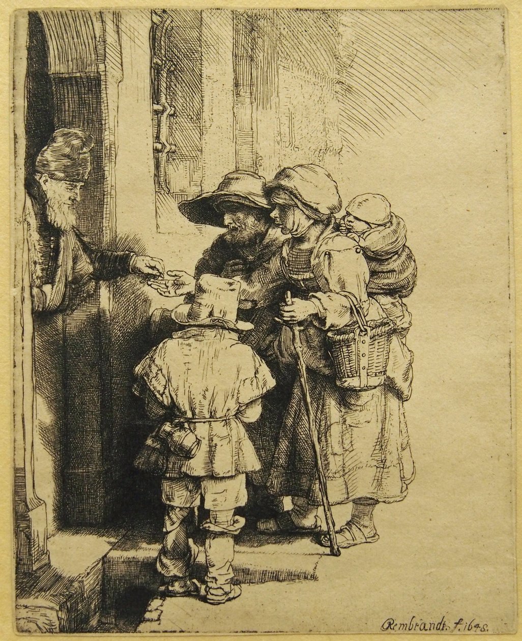 Een Blinde Draailierspeler en Familie die Aalmoezen Ontvangen door Rembrandt van Rijn