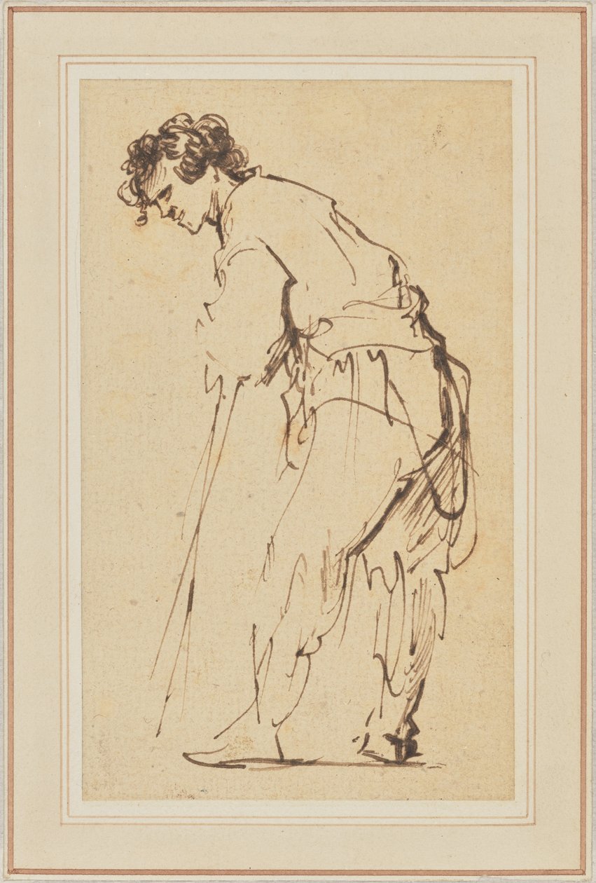 Jonge man leunend op een stok door Rembrandt Harmensz. van Rijn