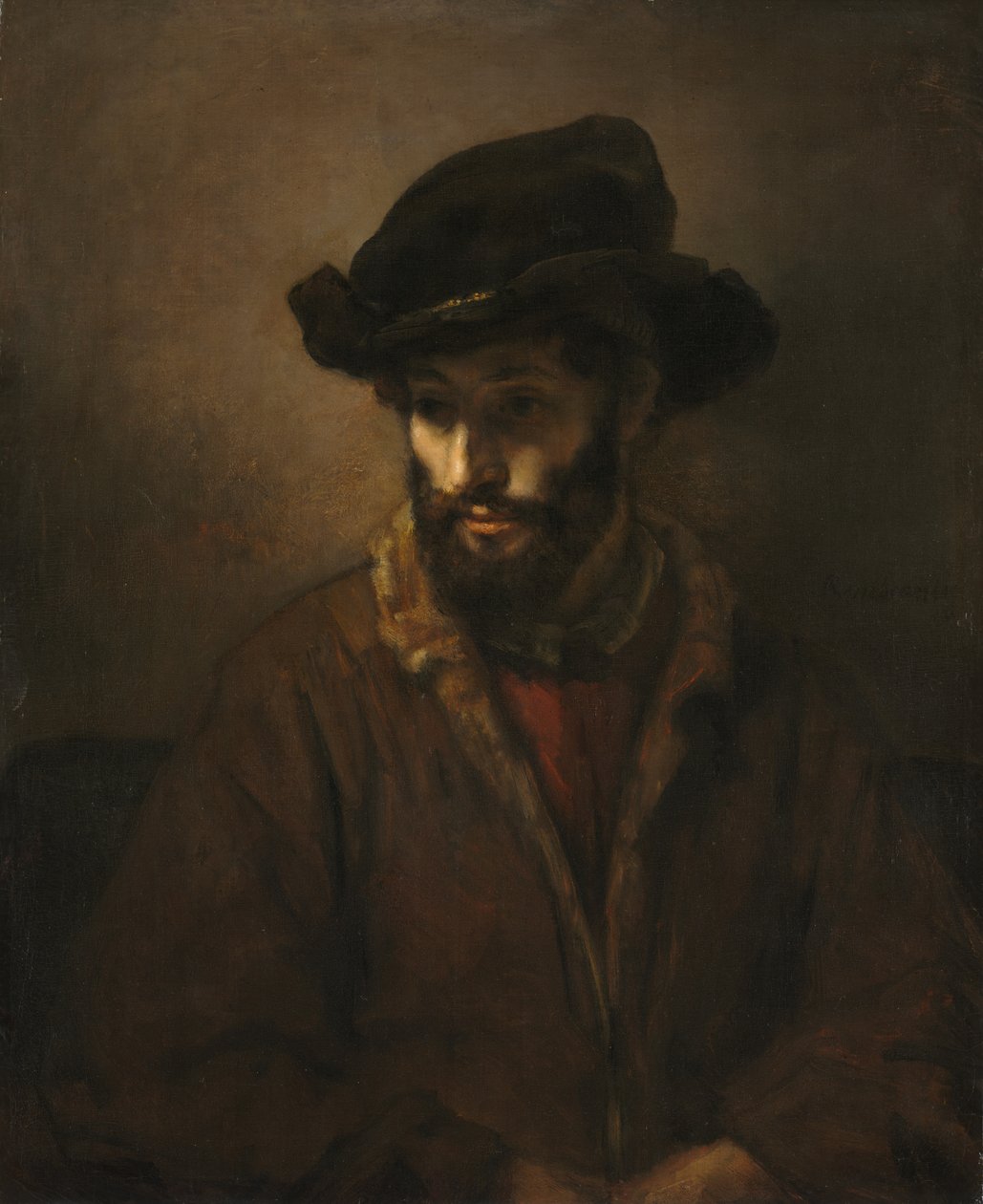 Een bebaarde man met een hoed door Rembrandt van Rijn